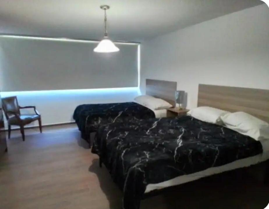 Habitación Doble - 2 camas dobles